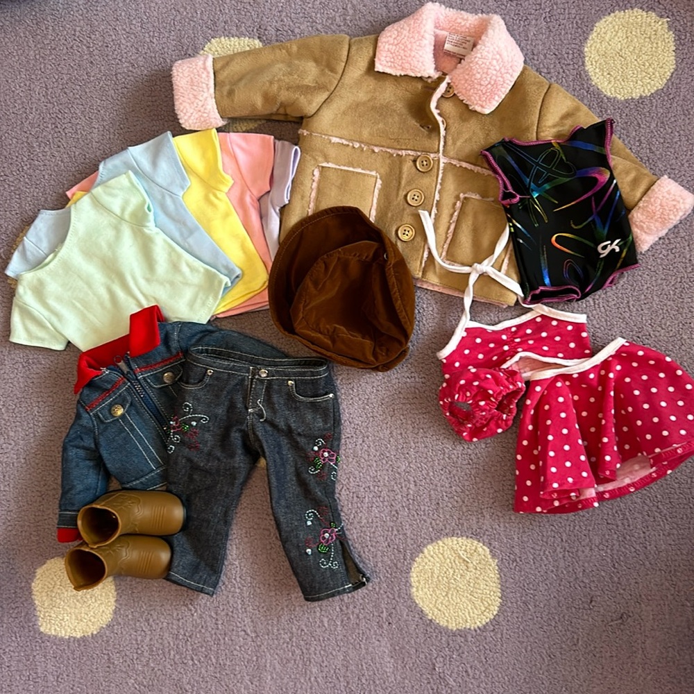 Assorted American Girl doll clothes